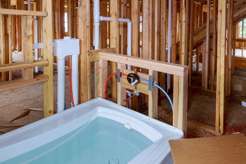 Contractor Working on Tub Installation